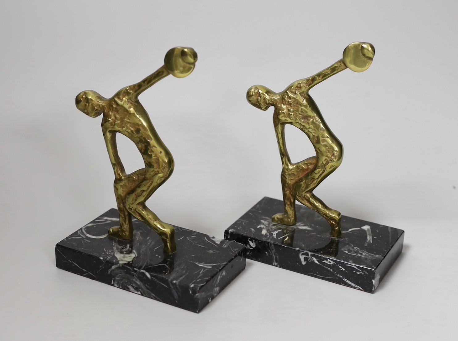 A pair of 1940s/50s French gilded bronze figural bookends, 17cm